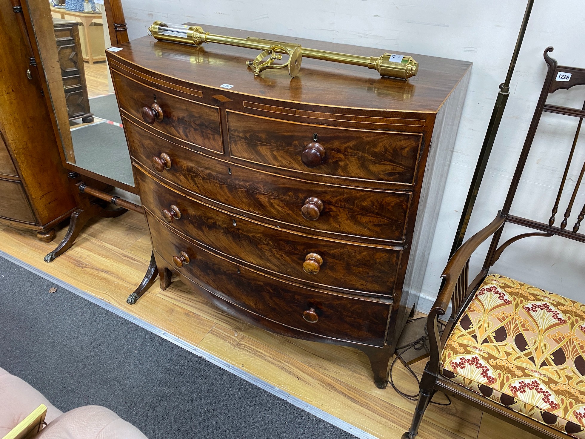 An early Victorian mahogany bowfront chest of two short and three long drawers, width 95cm, depth 51cm, height 106cm